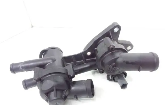Thermostat/thermostat housing