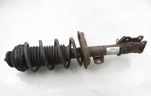 Opel Corsa D Front shock absorber with coil spring 13214354