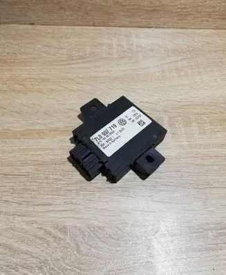 Volkswagen Touareg I Alarm control unit/module 7L0907719