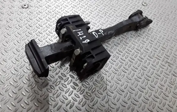 Front door check strap stopper