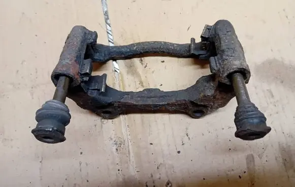 Opel Corsa D Front Brake Caliper Pad/Carrier 
