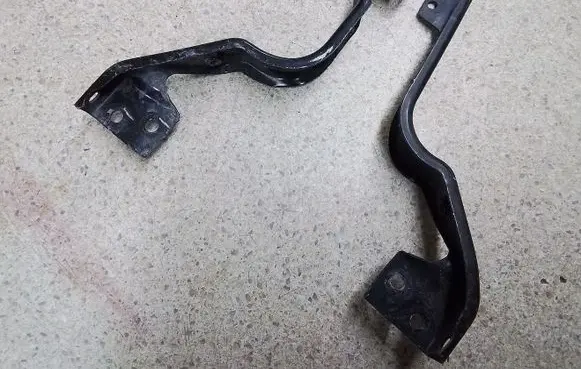 Radiator support slam panel bracket