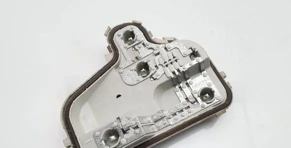 Tail light bulb cover holder