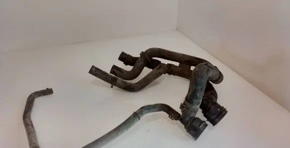 Volkswagen PASSAT B7 Engine coolant pipe/hose 1K0122971