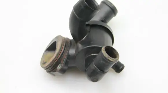 Thermostat/thermostat housing