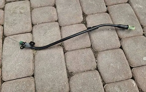 Oil level dip stick