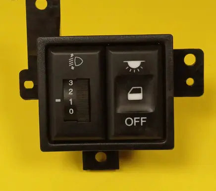 Headlight level height control switch