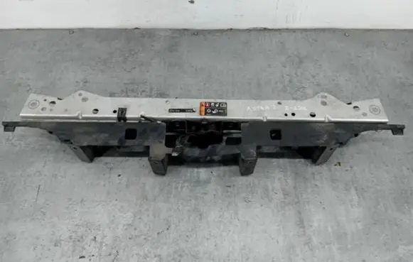 Top upper radiator support slam panel