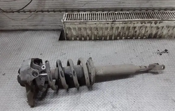 Front shock absorber with coil spring
