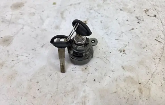 Saab 9-3 Ver2 Coupe door lock (next to the handle) 12799781