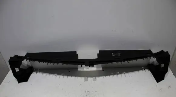 Engine bonnet/hood lock trim molding