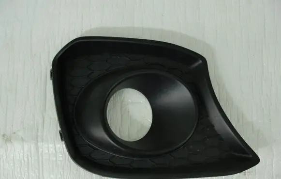Suzuki Swift III Front fog light trim/grill 7175168RO