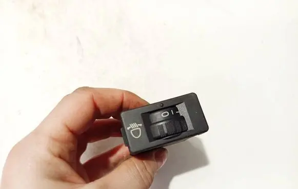 Headlight level height control switch