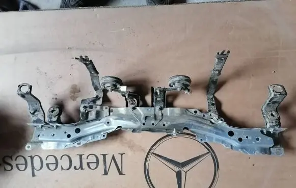 Top upper radiator support slam panel