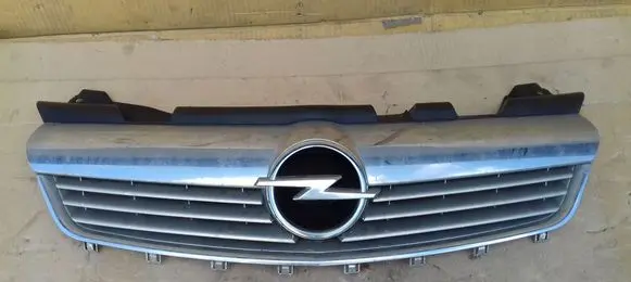 Opel Zafira B Front bumper upper radiator grill GM13157590