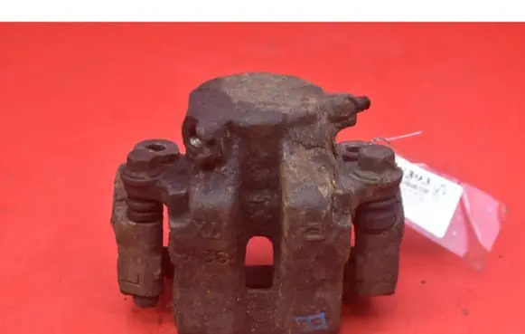 Suzuki Grand Vitara I Front brake caliper