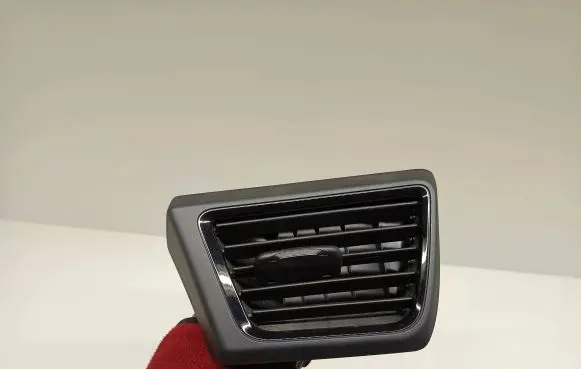 Nissan Leaf II (ZE1) Dash center air vent grill 687615SA0B LG60PG05