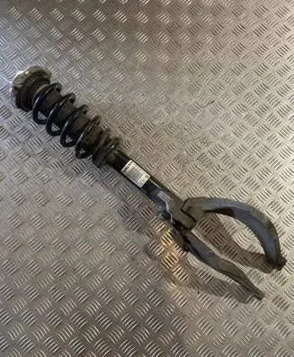 Front shock absorber with coil spring