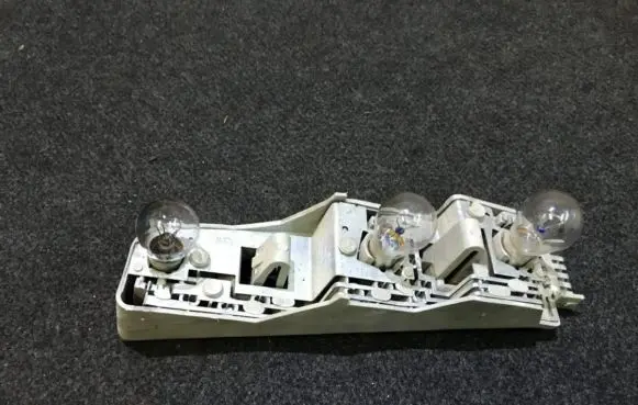 Ford Fiesta Tail light bulb cover holder