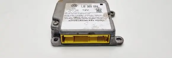 Volkswagen PASSAT B5 Airbag control unit/module 1J0909604