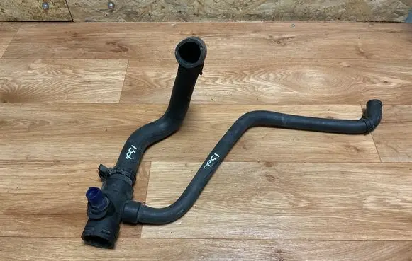 Volkswagen PASSAT B5 Engine coolant pipe/hose 4B0121049K
