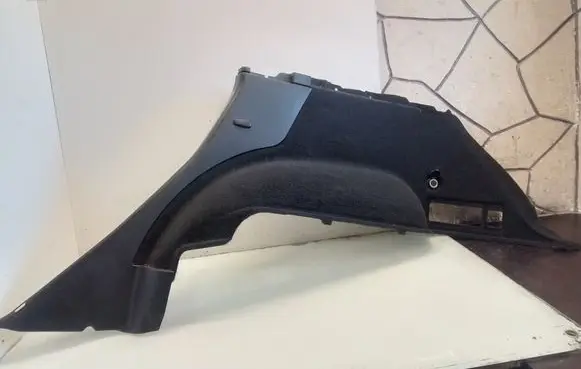 Trunk/boot lower side trim panel