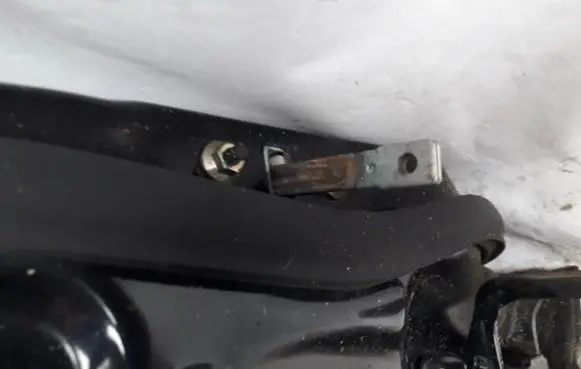 Mazda Demio Rear door check strap stopper