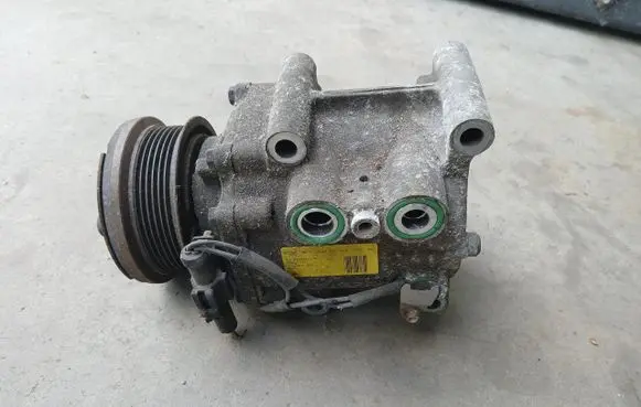 Ford Fiesta Air conditioning (A/C) compressor (pump) YS4H19D629AD