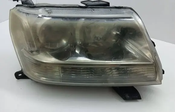 Suzuki Grand Vitara II Headlight/headlamp 10059079