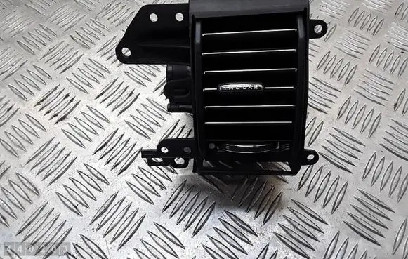 Jaguar XF Dash center air vent grill DRS6615Z03