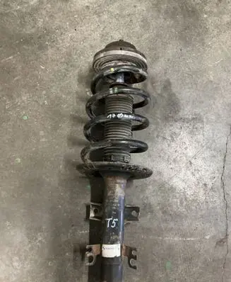 Volkswagen Transporter - Caravelle T5 Front shock absorber with coil spring 7H041303N 7E541303H