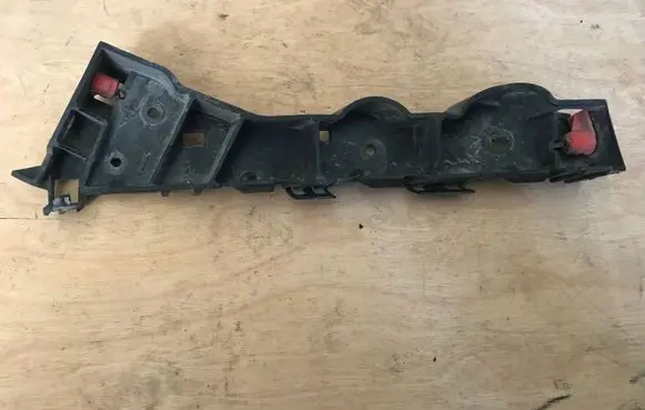 Opel Zafira B Fender mounting bracket 13124998