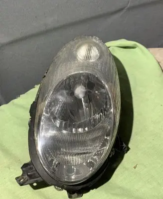 Nissan Micra Headlight/headlamp 89900074