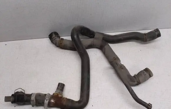Volkswagen Golf V Engine coolant pipe/hose 1K0121049AM