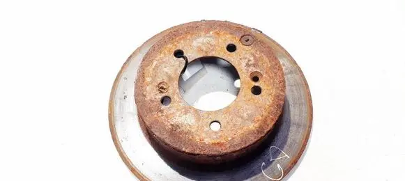 KIA Carens II Rear brake disc neventiliuojamas