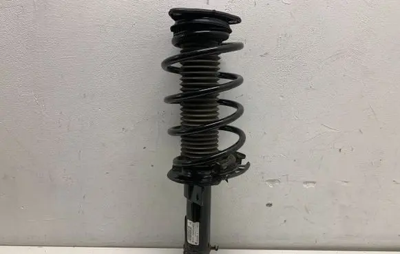 Ford Focus Front shock absorber with coil spring BV6118045LAB E5632402