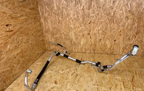 KIA Xceed Air conditioning (A/C) pipe/hose 97775J7200