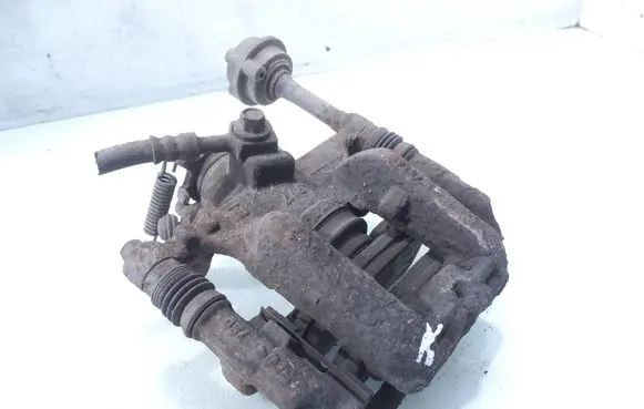 Opel Astra J Rear brake caliper 