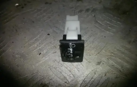 Headlight level height control switch