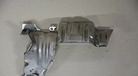 Volkswagen Golf VII Heat shield in engine bay 06K129597C