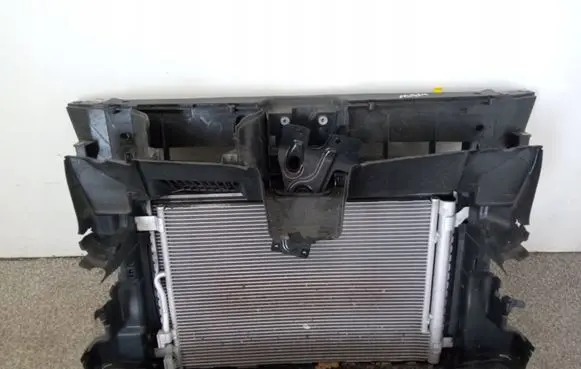 Radiator support slam panel