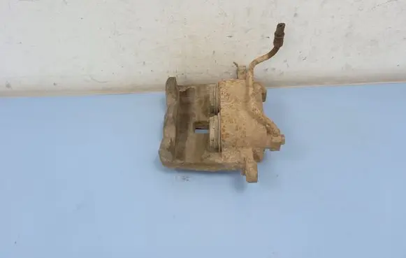 Jeep Grand Cherokee (WJ) Front brake caliper 5093180AA K05093180AA