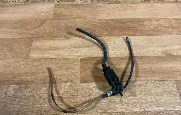 Nissan Primera Headlight washer pump 30097