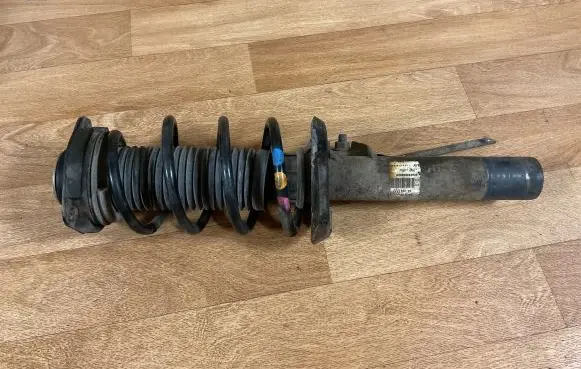 Volkswagen Golf V Front shock absorber with coil spring 1T0413031 824904003838 V0571WD