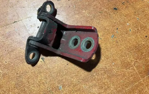 Nissan Micra Rear door lower hinge