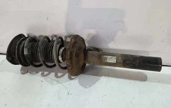 Volkswagen Golf VII Front shock absorber with coil spring 5Q0413023