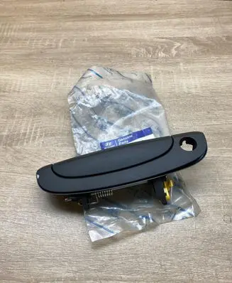 Hyundai Accent Front door exterior handle 826600B000CA 826600B000