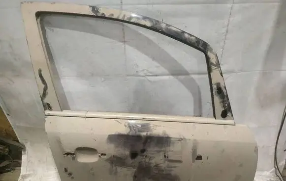 Opel Zafira B Front door JUODOS