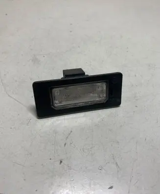 Volkswagen PASSAT B6 Number plate light 8T0943021