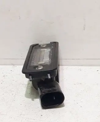 Volkswagen Golf V Number plate light 1J6943021B